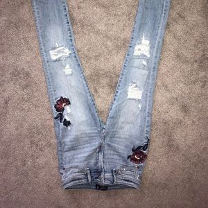 embroidered light wash jeans